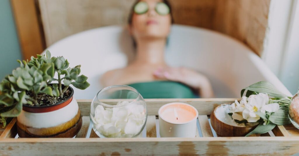 pexels-photo-6724383-6724383 Woman relaxing in a bathtub with a candle and plants, enjoying a serene spa experience.